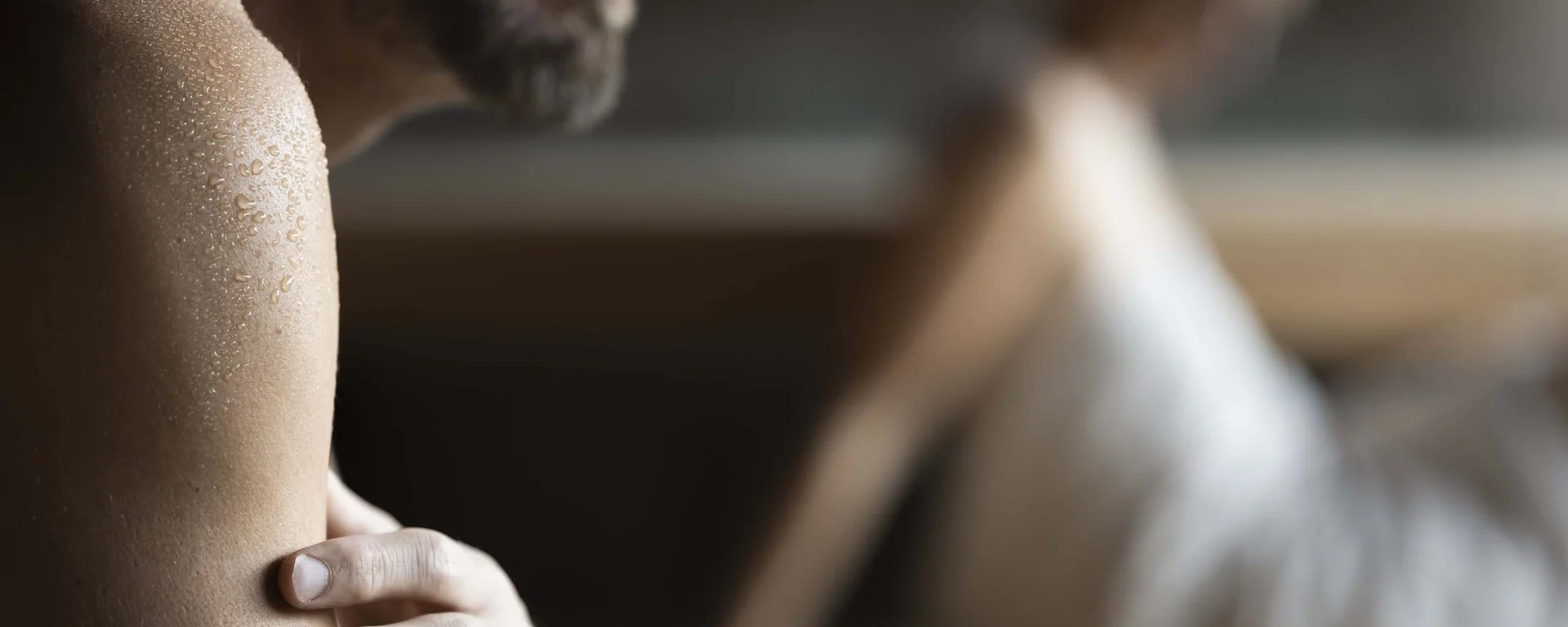 Hotel Monika: your adults-only hotel in South Tyrol Man and woman relaxed and wet in a sauna