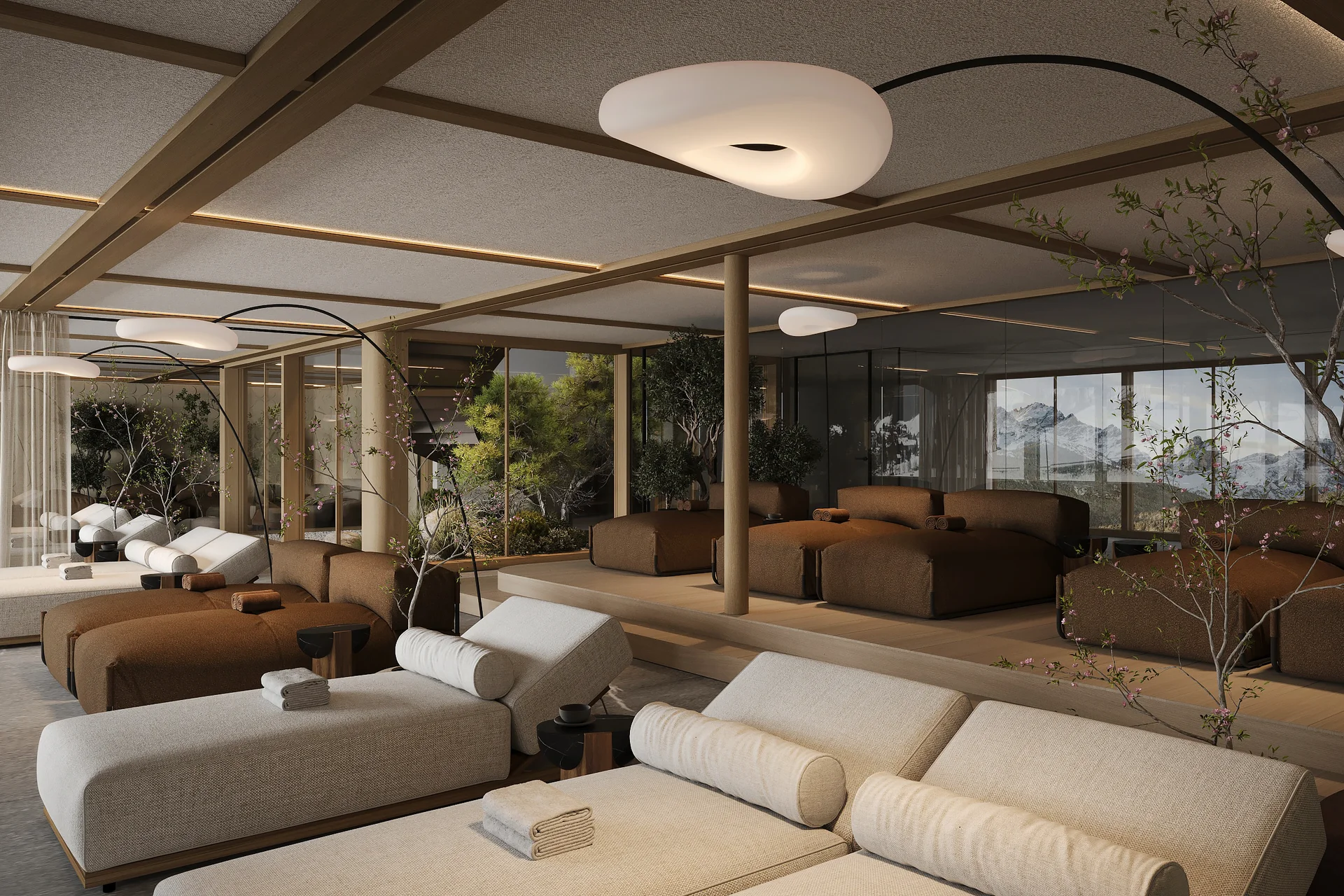 Hotel Monika in Sexten: Wohlbefinden inmitten der Dolomiten Moderne entspannende Lounge mit Liegestühlen und großen Spiegeln