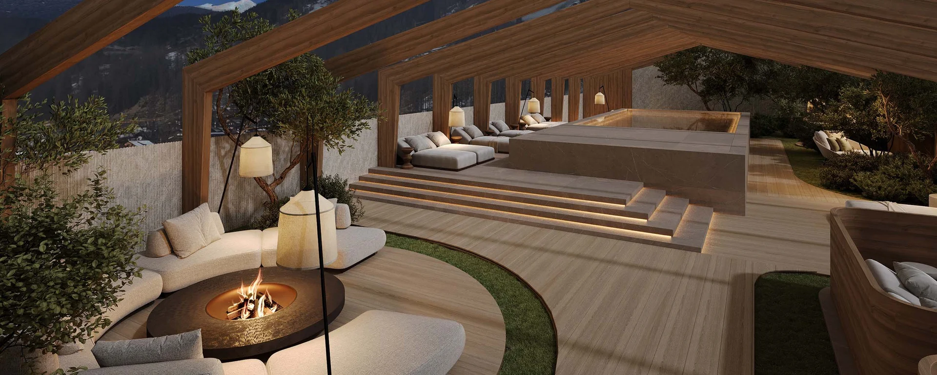 Hotel Monika in the Dolomites – with pools and spa area Modern outdoor area with fire pit, loungers, and wooden structure at night