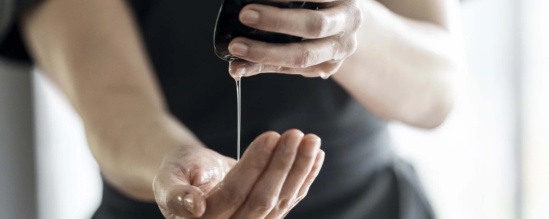 Vacancies at Hotel Monika Man receiving massage with oil dripping from a stone