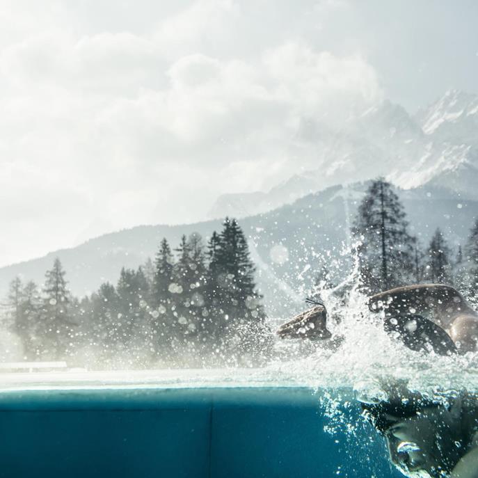 Swimming in the infinity outdoor pool